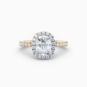 cushion cut halo engagement ring in yellow gold